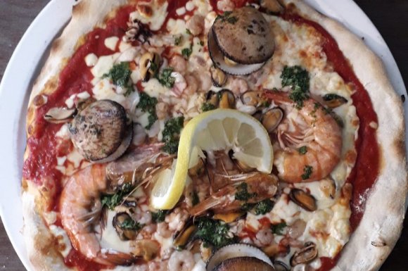 Pizzeria proposant un menu avec une place de cinéma offerte Porte-de-Savoie